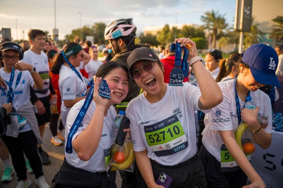 Cyber Run and Ride 2026, medal finishers celebration